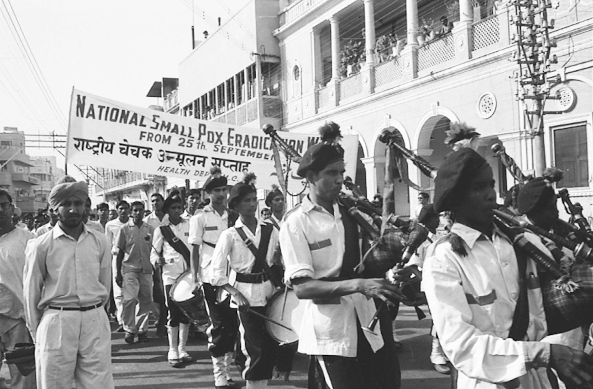 Participants of an anti-smallpox procession walk through Delhi, India