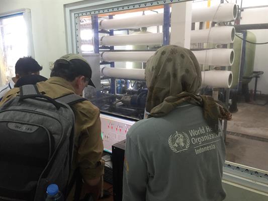 Water Quality testing WHO staff test water quality